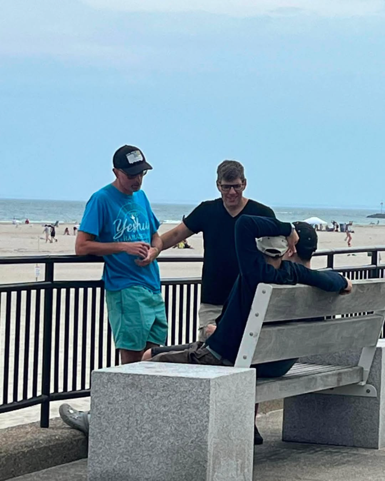Outreach conversation and prayer at Hampton Beach